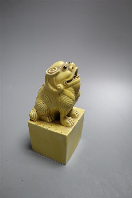 A Chinese glazed biscuit lion-dog seal, a Chinese blue and white tureen, width 18cm, two Shiwan figures and two teabowls and four sauce